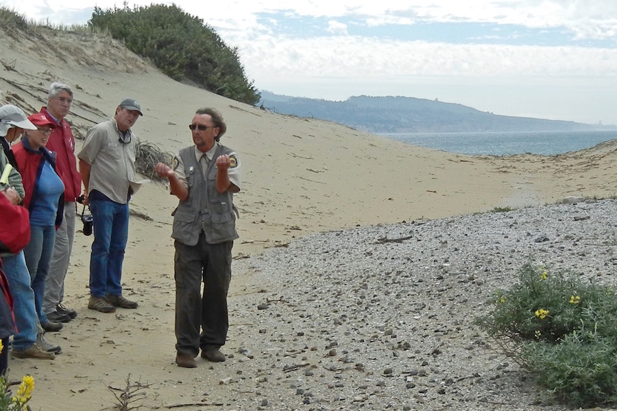 Mark Hylkema instructing volunteer docents at an archaelological site in Año Nuevo SP. (Photo: CSPA archive)